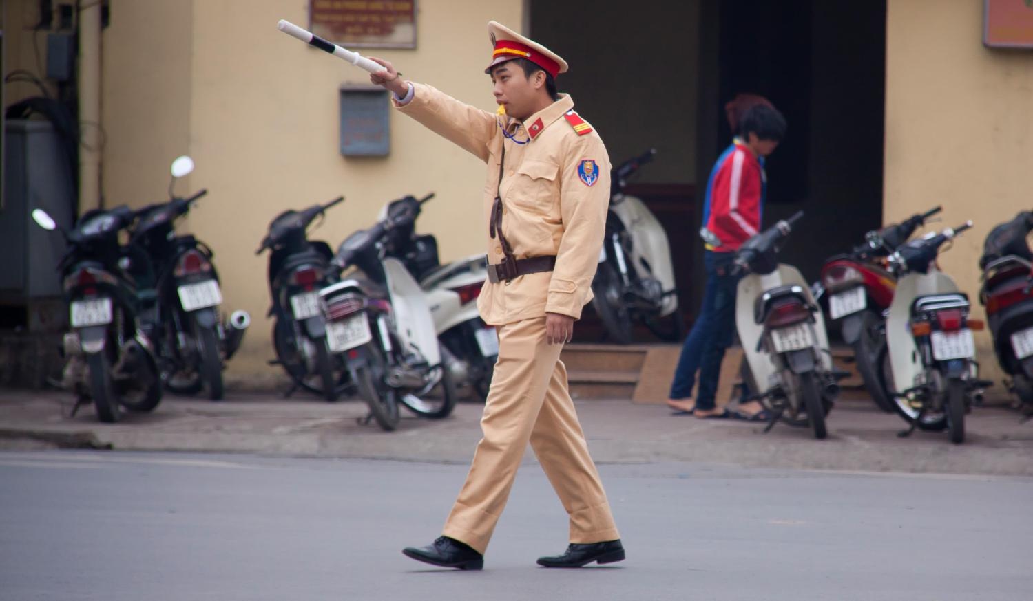Police officer in Hanoi (Photo: Chris Goldberg/Flickr)