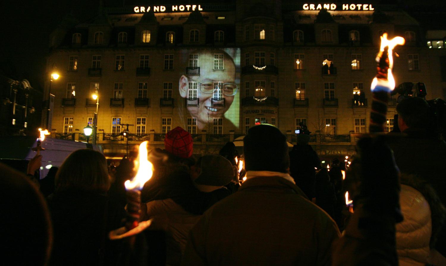 Liu Xiaobo's image projected onto an Oslo hotel after he was awarded the Nobel Peace Prize (Photo: Flickr/Aktiv|Oslo.no)