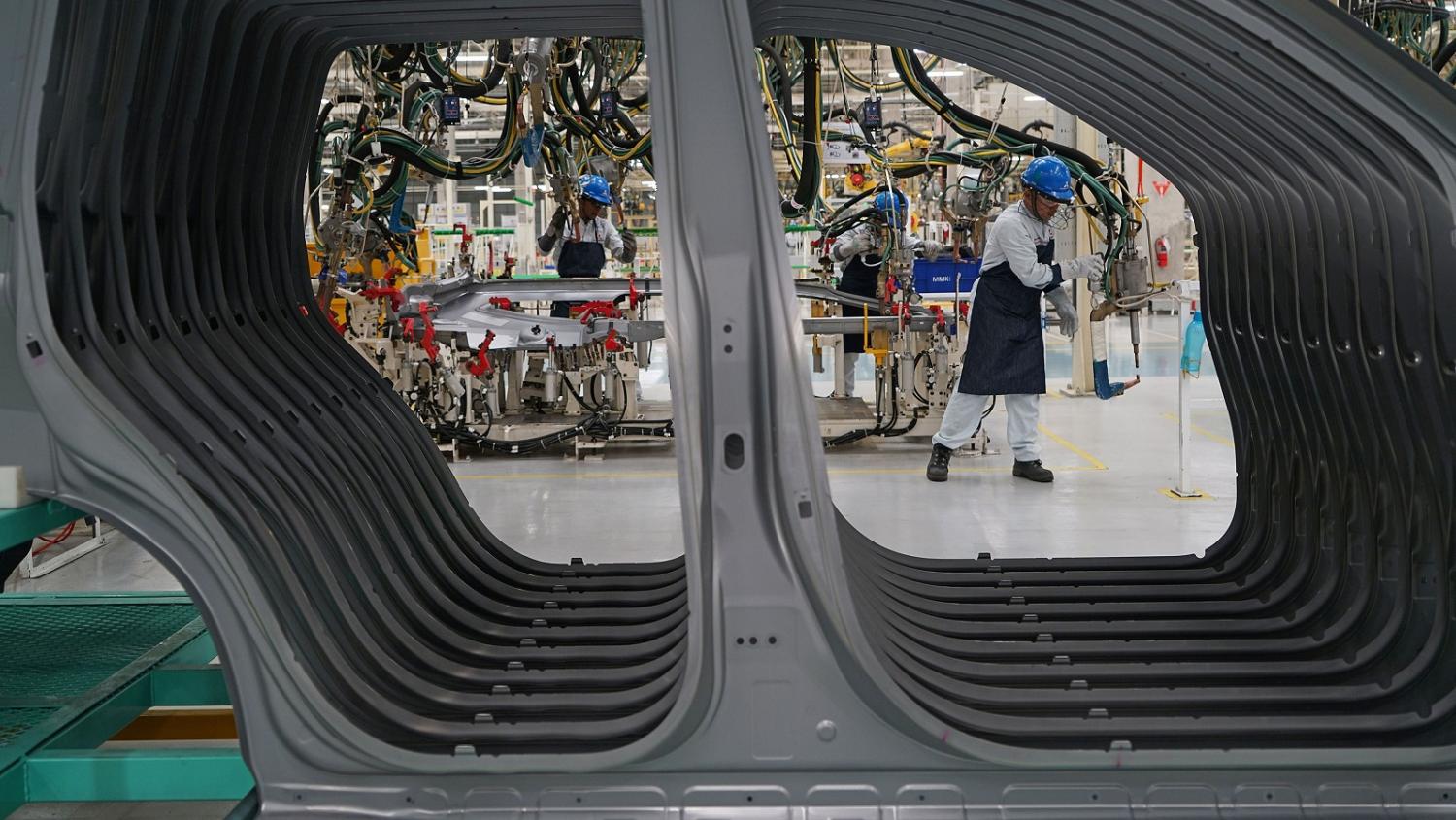 A production line at the new Mitsubishi Motors plant in Cikarang, Indonesia (Photo: Dimas Ardian/Getty Images)