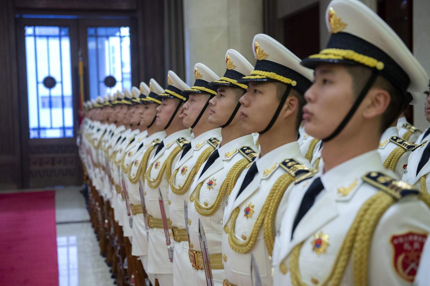 Chinese sailors before a visit by Chief of Naval Operations Adm. John Richardson to the PLA Navy headquarters, Beijing, 14 January 2019 (Elliott Fabrizio/US Navy/Flickr)