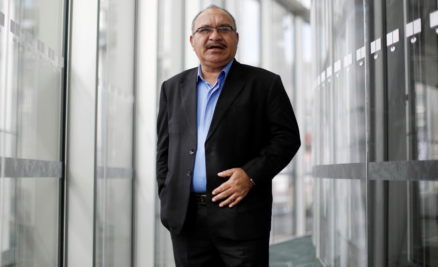 PNG's most recent PM Peter O'Neill has retained his seat in the recent election and his party is forecast to be called on to form government. (Photo: David Moir/ via Getty Images)