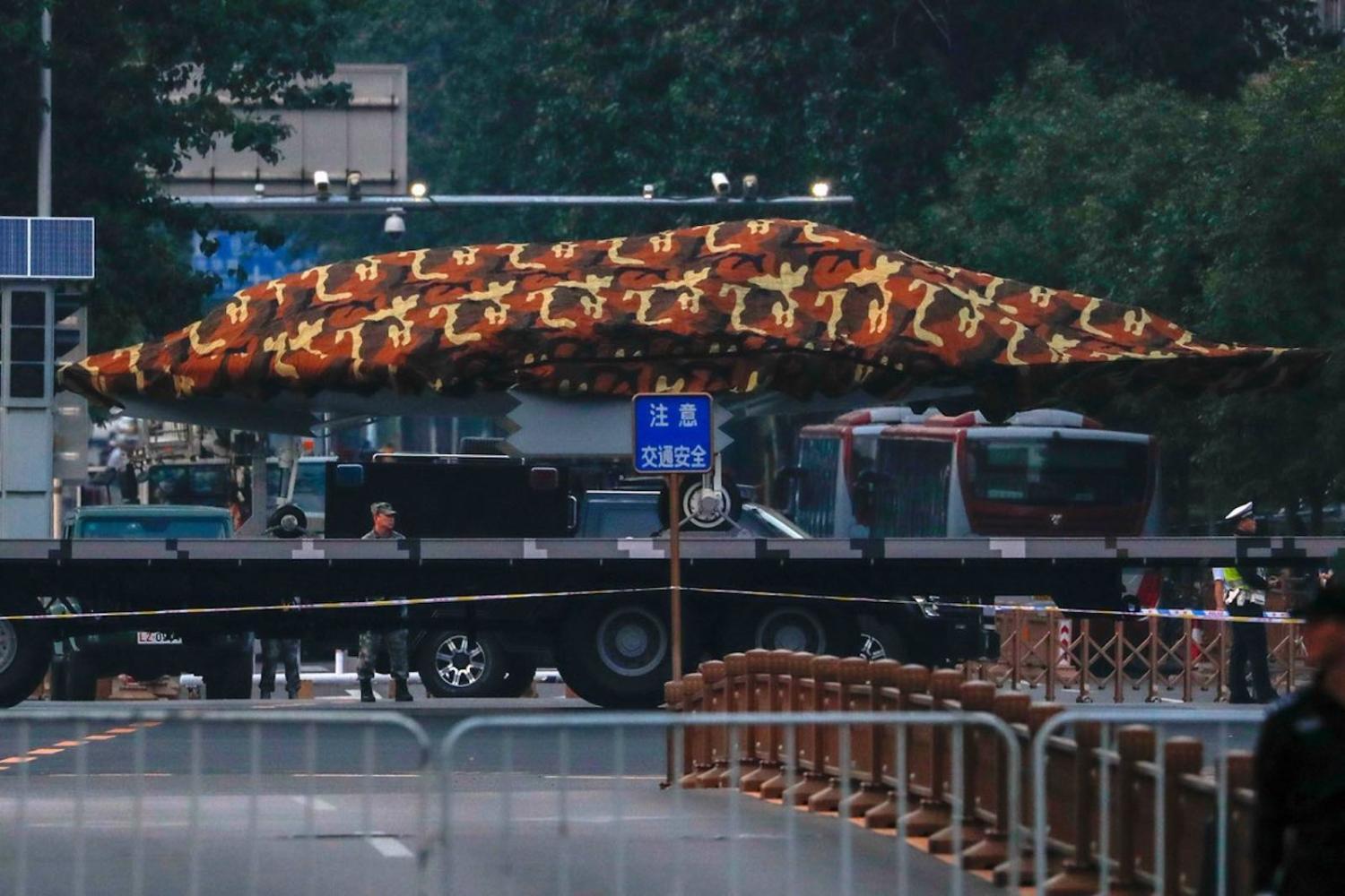 A truck carrying what is almost certainly the Sharp Sword drone ahead of a military parade in Beijing (Photo courtesy of Sinodefence Forum)