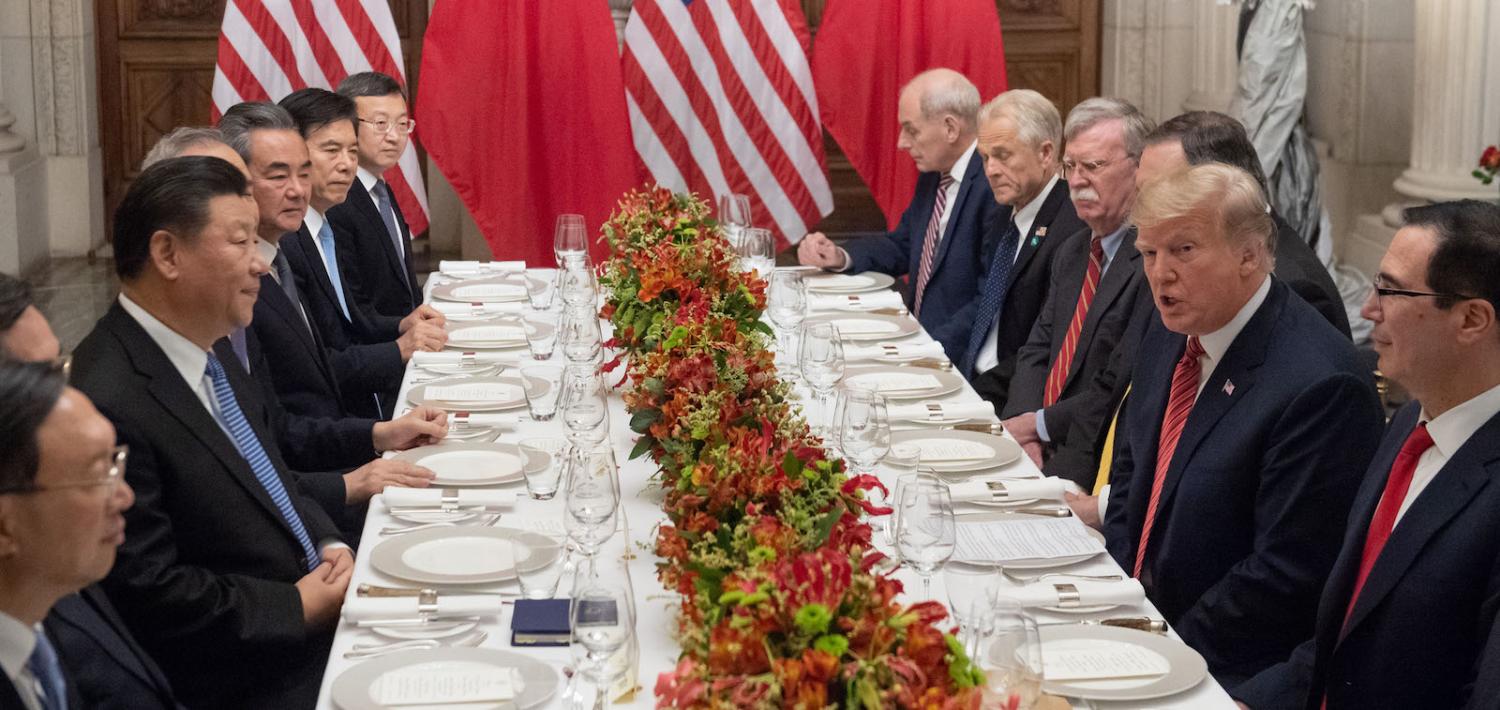 US President Donald Trump and his Chinese counterpart Xi Jinping had the future of their trade dispute n the menu at a high-stakes dinner Saturday. (Photo: Saul Loeb via Getty)