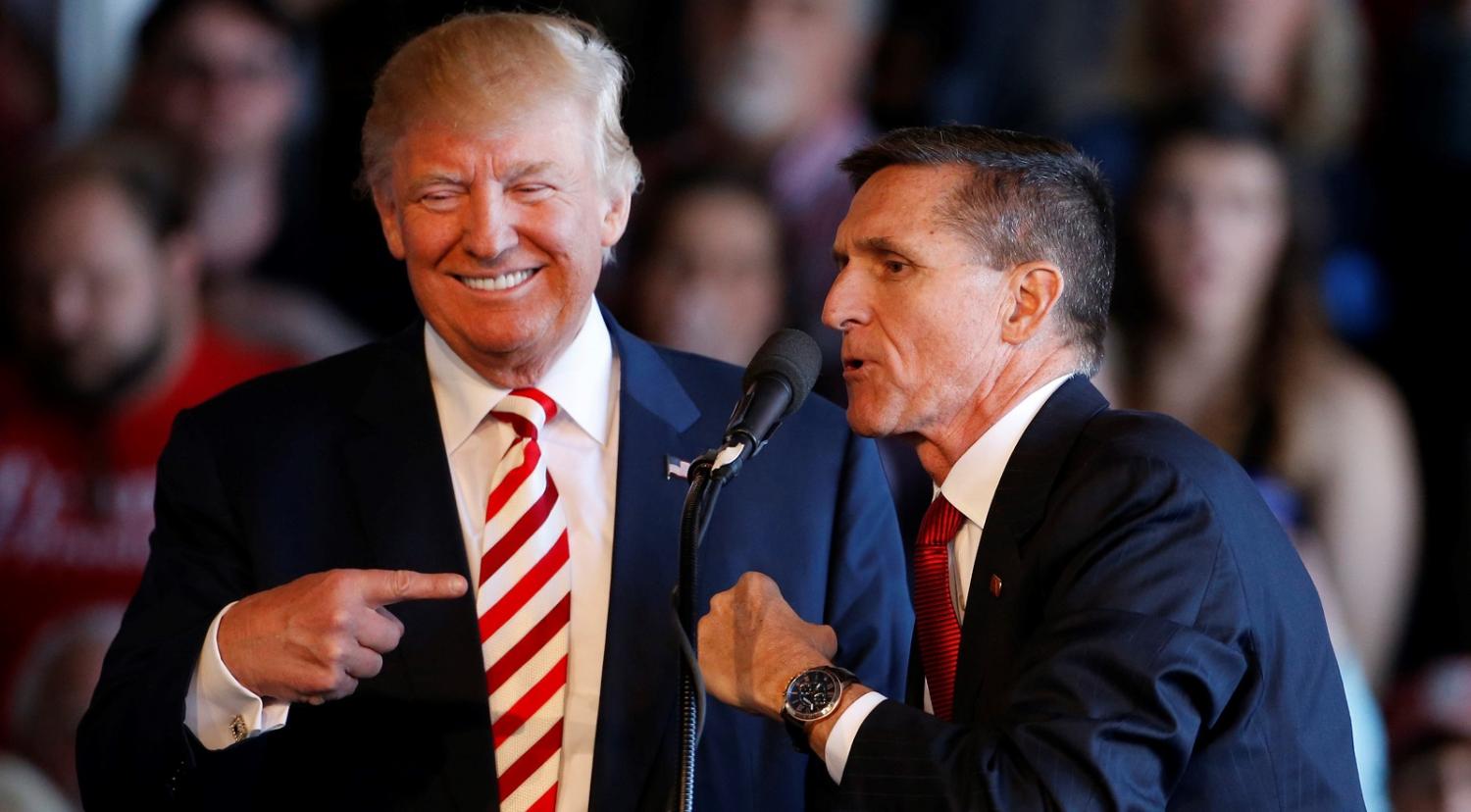 Donald Trump with Mike Flynn on the campaign trail in October (Photo: George Frey/Getty Images)