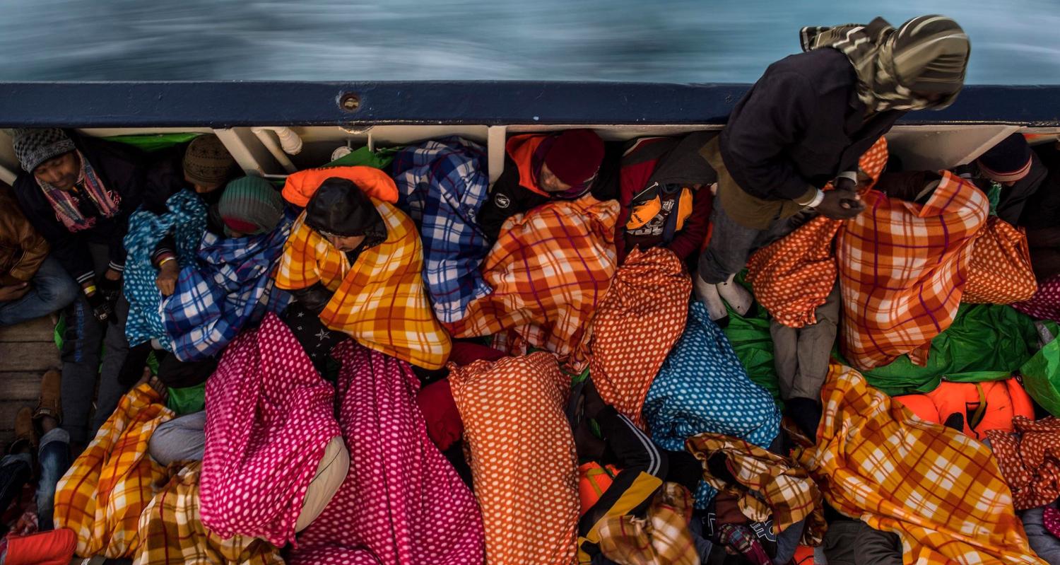 Migrants and asylum seekers on the deck of a Spanish rescue vessel in the Mediterranean, February 2017 (Photo: Getty Images/David Ramos)