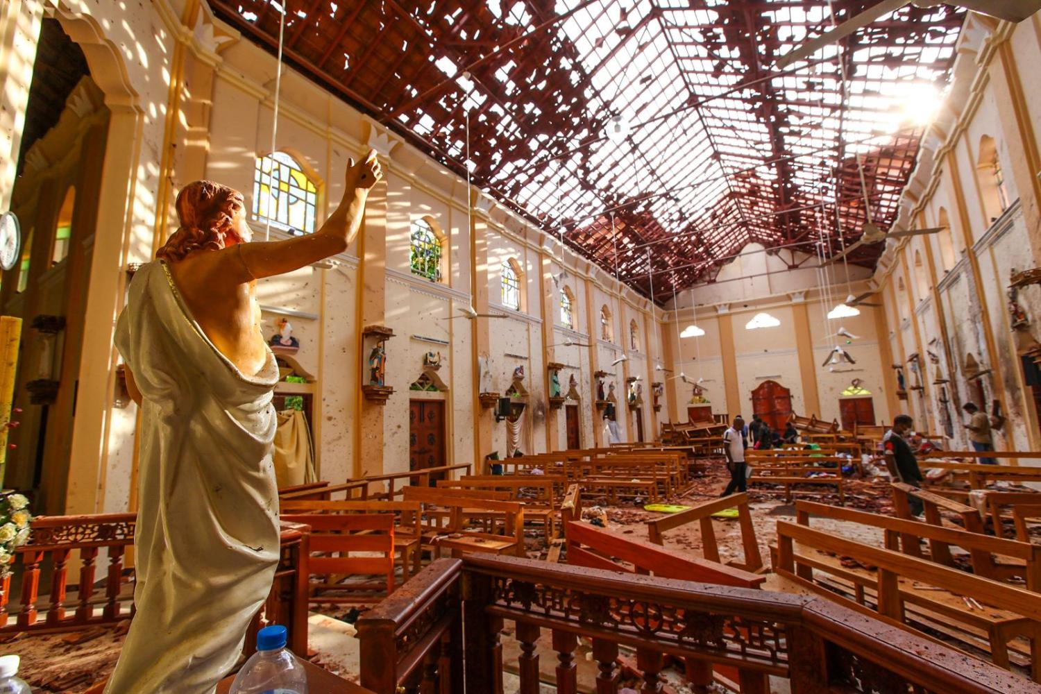 Officials inspect the damaged St. Sebastian's Church after co-ordinated explosions on April 21, 2019 in Negombo, north of Colombo, Sri Lanka. (Photo: Stringer/Getty)