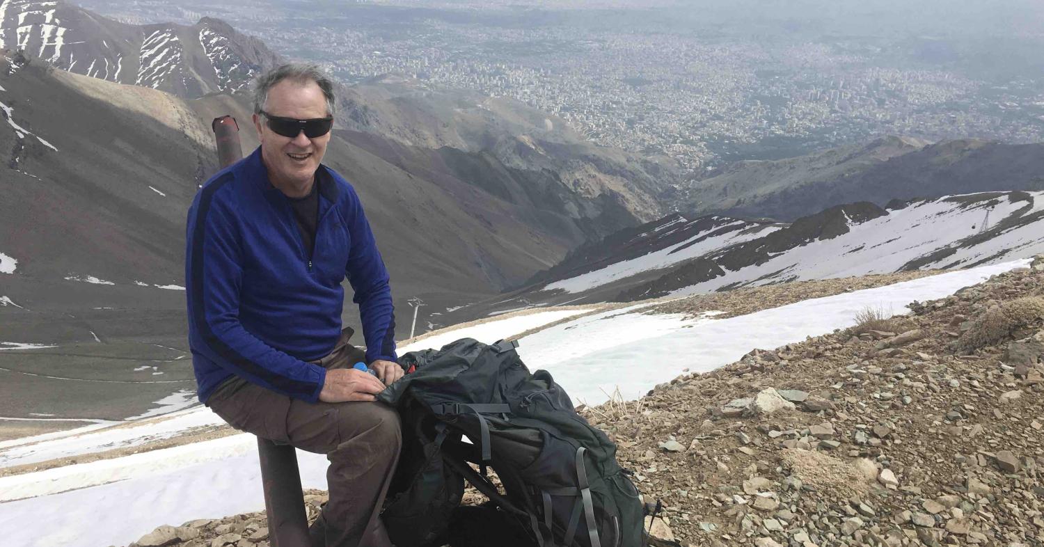 Your hardy correspondent atop Mt Tochal, the sprawl of Tehran below.