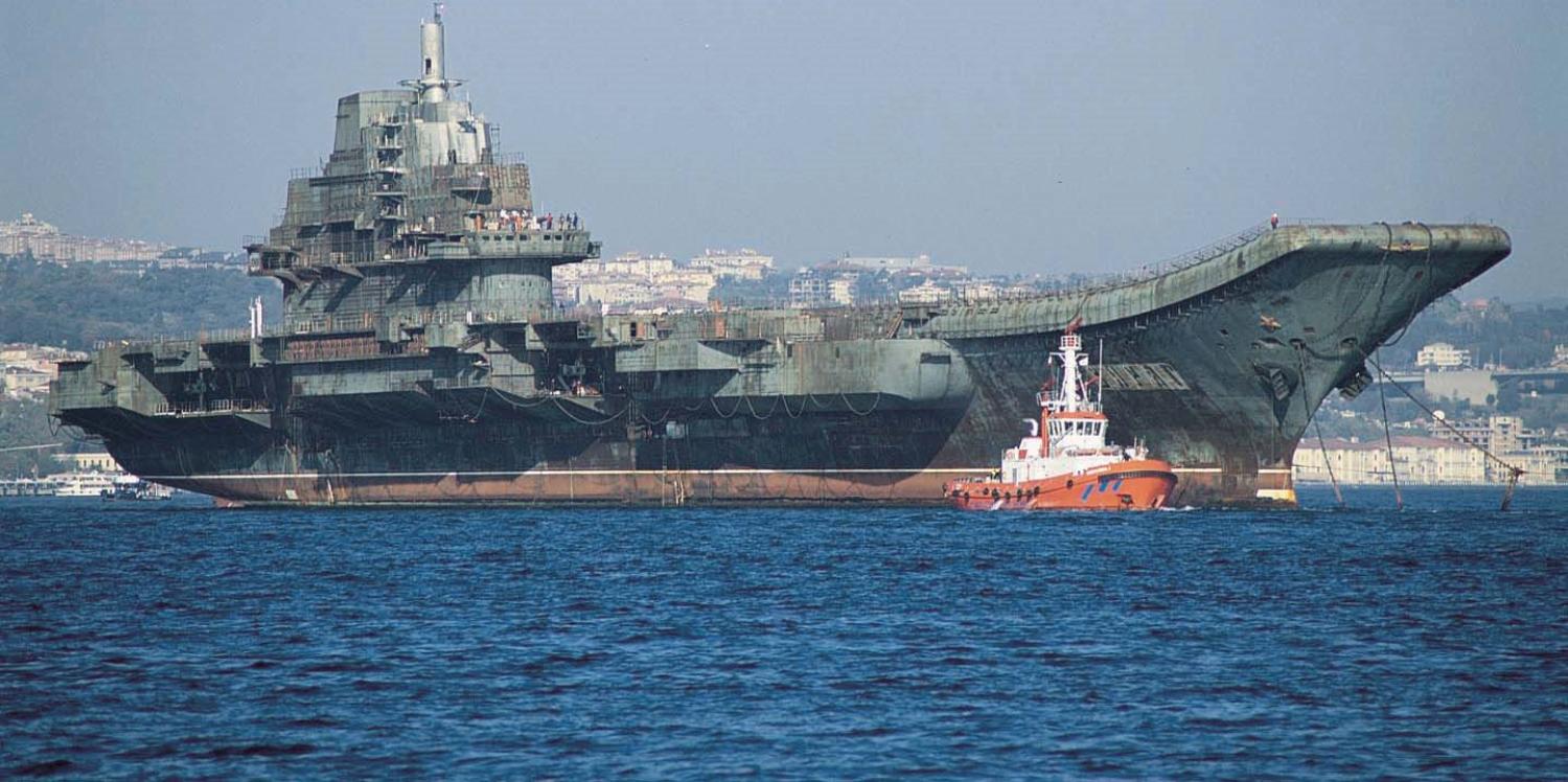 The unfinished ex-Soviet aircraft carrier Varyag under tow in Istanbul en route to China, 2001. (Wikipedia)