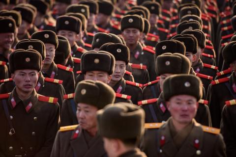 Korean People’s Army (KPA) soldiers gather before the statues of late North Korean leaders Kim Il-sung and Kim Jong-il, Pyongyang (Ed Jones/AFP via Getty Images)