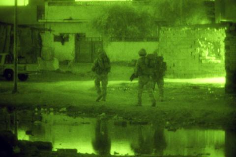 British soldiers patrolling near Sharkarta, Iraq in 2005 (UK Ministry of Defence)