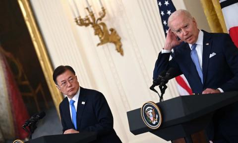 South Korean President Moon Jae-in and US President Joe Biden in the East Room of the White House on 21 May (Brendan Smialowski/AFP via Getty Images)