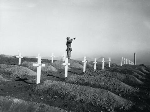 A memorial service on 13 December 1950 in Hungnam, Korea at the graves of fallen US Marines following the break-out from Chosin Reservoir (Corbis via Getty Images)
